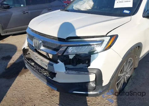 2019 Honda Pilot Elite z USA, uszkodzony, nr VIN 5FNYF6H09KB055155